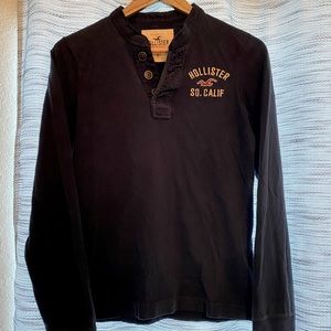 Sized small long sleeved, navy blue Hollister shirt.